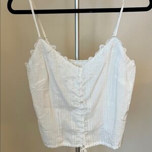Heartloom dressy white tank top with tie on the bottom and pretty detailing